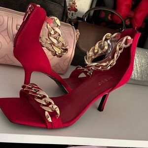 Public Desire Red Heels with Gold Chain Accents